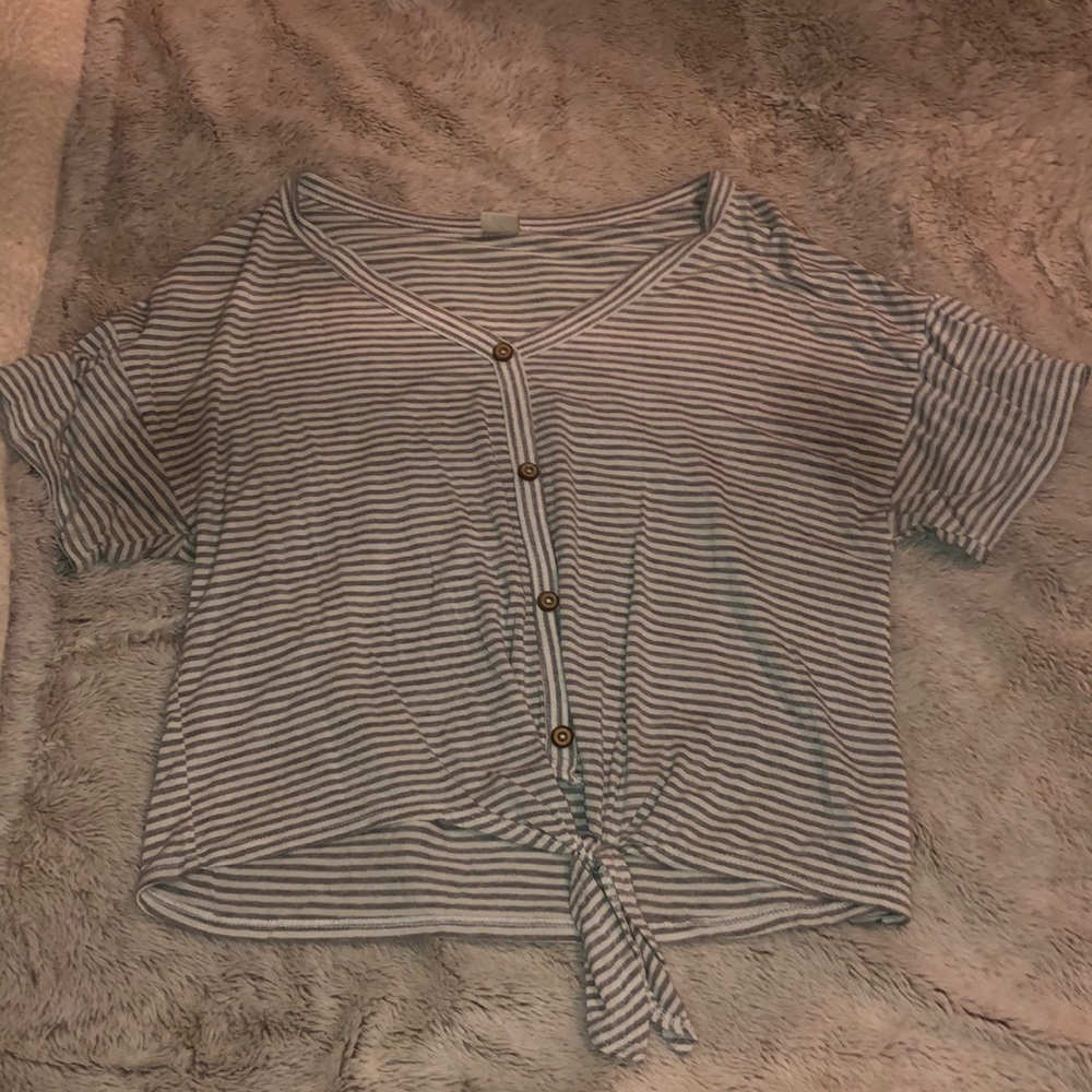 grey t shirt with buttons